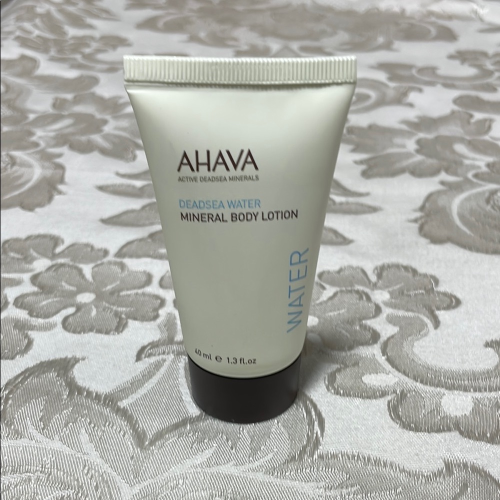 AHAVA White and Black Moisturizer Tube